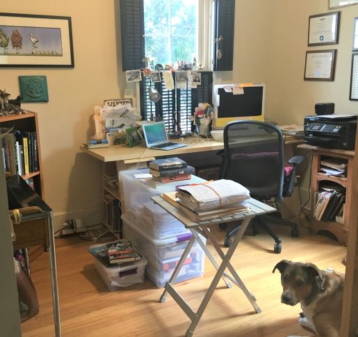 Candace Fleming's home study with her dog.