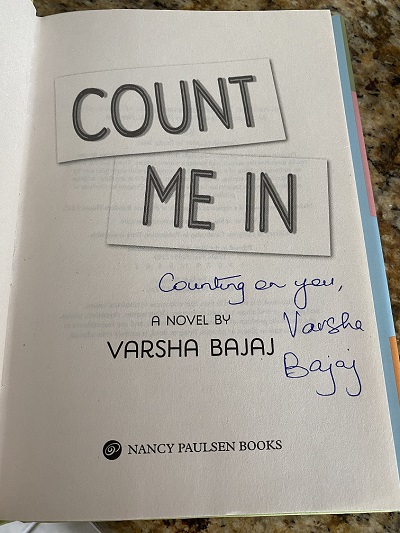 The title page of the novel Count Me In, signed by the author, Varsha Bajaj