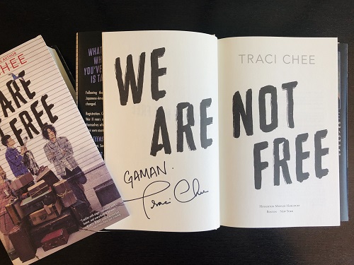 A copy of the YA novel We Are Not Free, signed by the author, Traci Chee.