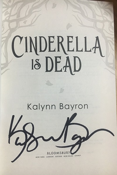 The title page of Cinderella Is Dead signed by the author, Kalynn Bayron.