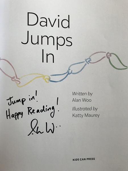 The title page of David Jumps In, signed by the author, Alan Woo, with the message, "Jump In! Happy Reading!"