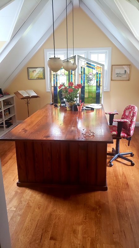 Author Kate Klise's study with her large wooden desk.