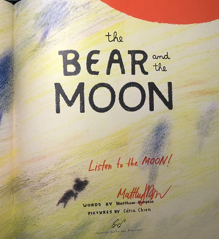 The title page of The Bear and the Moon, signed by the author, Matthew Burgess, with the message, "Listen to the Moon."