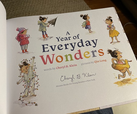 The title page of A Year of Everyday Wonders signed by the author, Cheryl B. Klein.