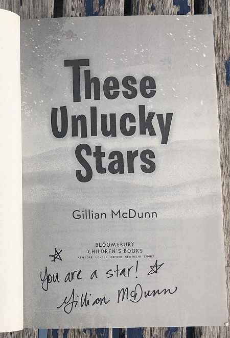 The title page of These Unlucky Stars, signed by the author, Gillian McDunn, with the message "You are a star!"