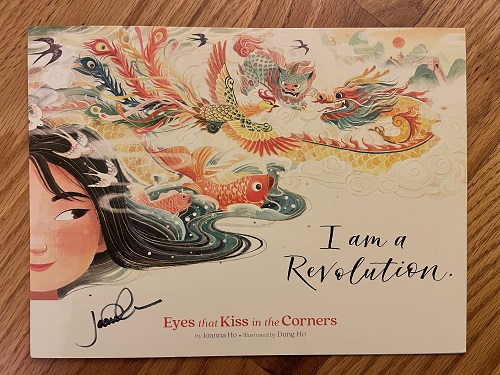 The title page of Eyes That Kiss in the Corners, signed by the author, Joanna Ho.