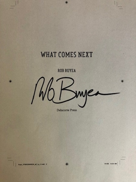 The title page of What Comes Next, signed by the author, Rob Buyea.