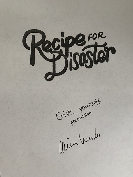 The title page of Recipe for Disaster signed by the author, Aimee Lucido, with the message, "Give yourself permission."