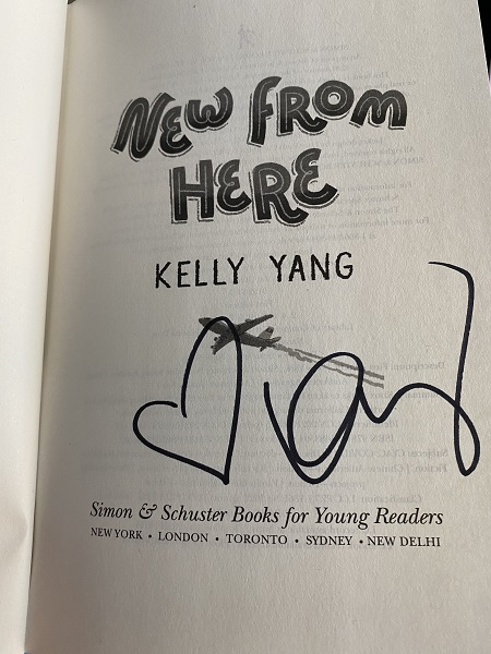 The title page of New From Here, signed by the author, Kelly Yang.