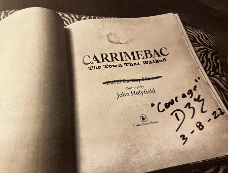 The title page of Carrimebac, the Town that Walked, signed by the author, David Barclay Moore, with the message, "Courage."