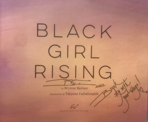 The title page of Black Girl Rising, signed by the author, Brynne Barnes, with the message, "Break sky with your wings."