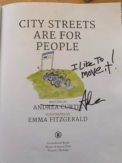 The title page of City Streets Are for People, signed by the author, Andrea Curtis, with the message, "I like to move it!"