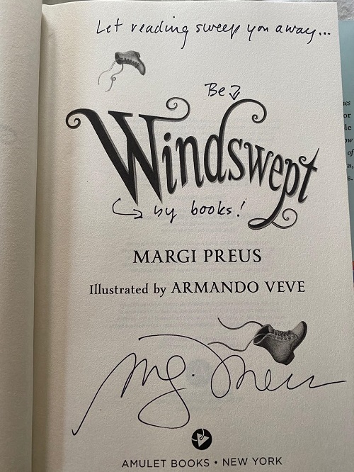 The title page of Windswept, signed by the author, Margi Preus, with the message, "Let reading sweep you away...Be windswept by books!"