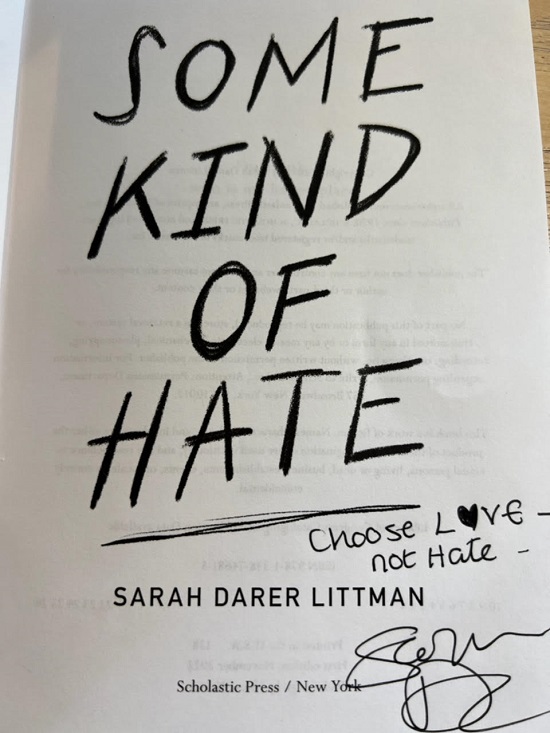The title page of Some Kind of Hate, signed by the author, Sarah Darer Littman, with the message, "Choose love, not hate."
