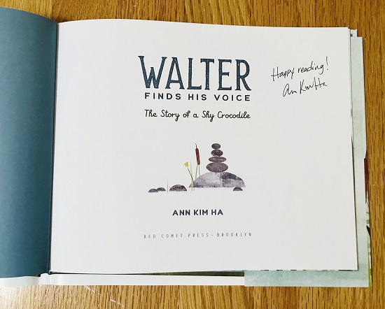 The title page of Walter Finds His Voice, signed by the author and illustrator, Ann Kim Ha, with the message, "Happy reading!"
