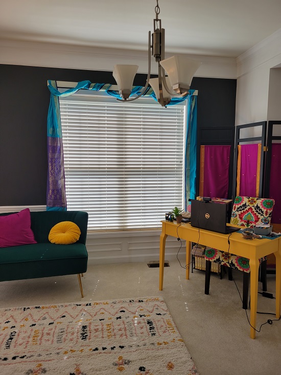 Author / illustrator Supriya Kelkar's writing studio decorated with bright colors and fabrics.