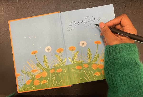 The endpapers of How Do I Draw, signed by the author, Jonell Joshua.