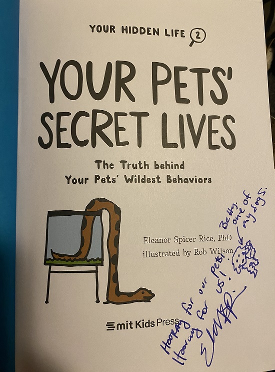 The title page of Your Pets' Secret Lives, signed by the author, Eleanor Spicer Rice with the message, "Hooray for our pets! Hooray for us!" And a cartoon drawing of a fluffy dog, with the message, "Betty, one of my dogs."