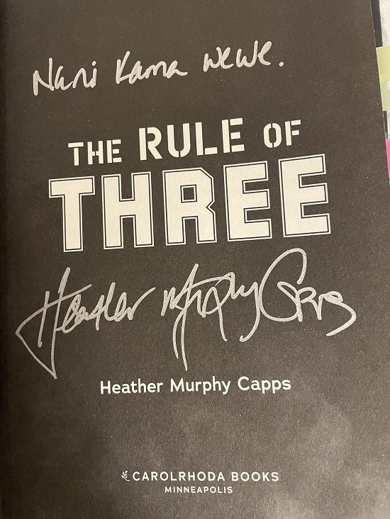 The title page of The Rule of Three, signed by the author, Heather Murphy Capps, with the message, "Nani kama wewe," which means "no one like you" in Swahili.