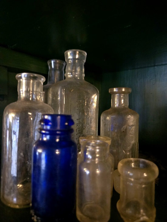 Marcella Pixley's collection of found glass bottles.