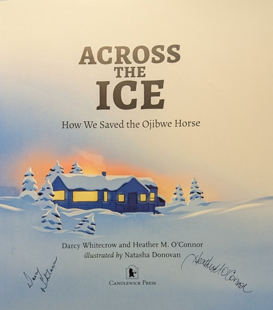 The title page of Across the Ice, signed by the authors, Darcy Whitecrow and Heather M. O'Connor.