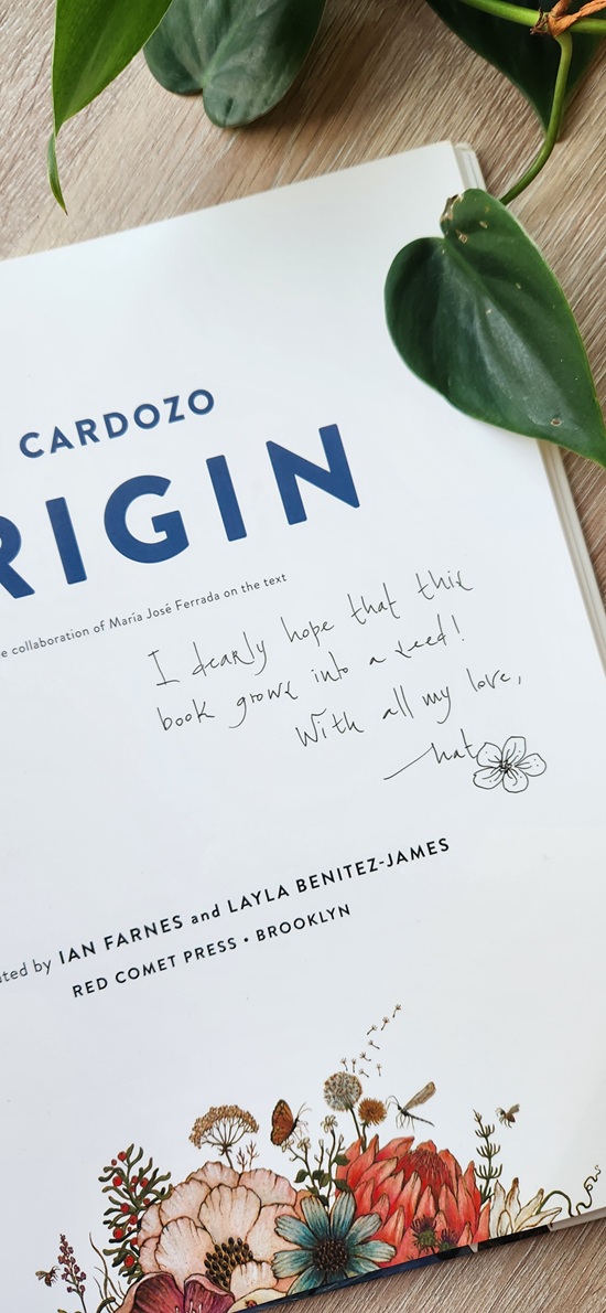 The title page of Origin signed by the Nat Cardozo with the message, "I dearly hope that this book grows into a seed! With all my love, Nat."